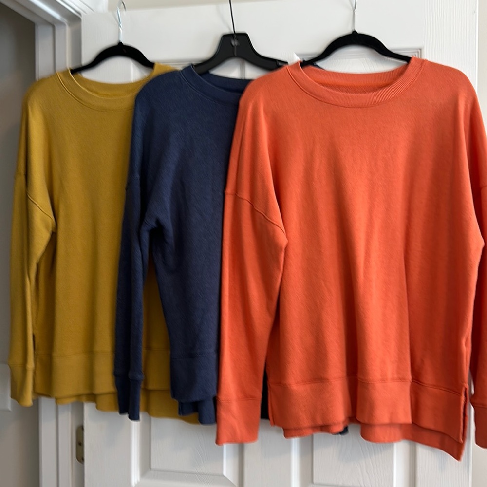 Three sweatshirts